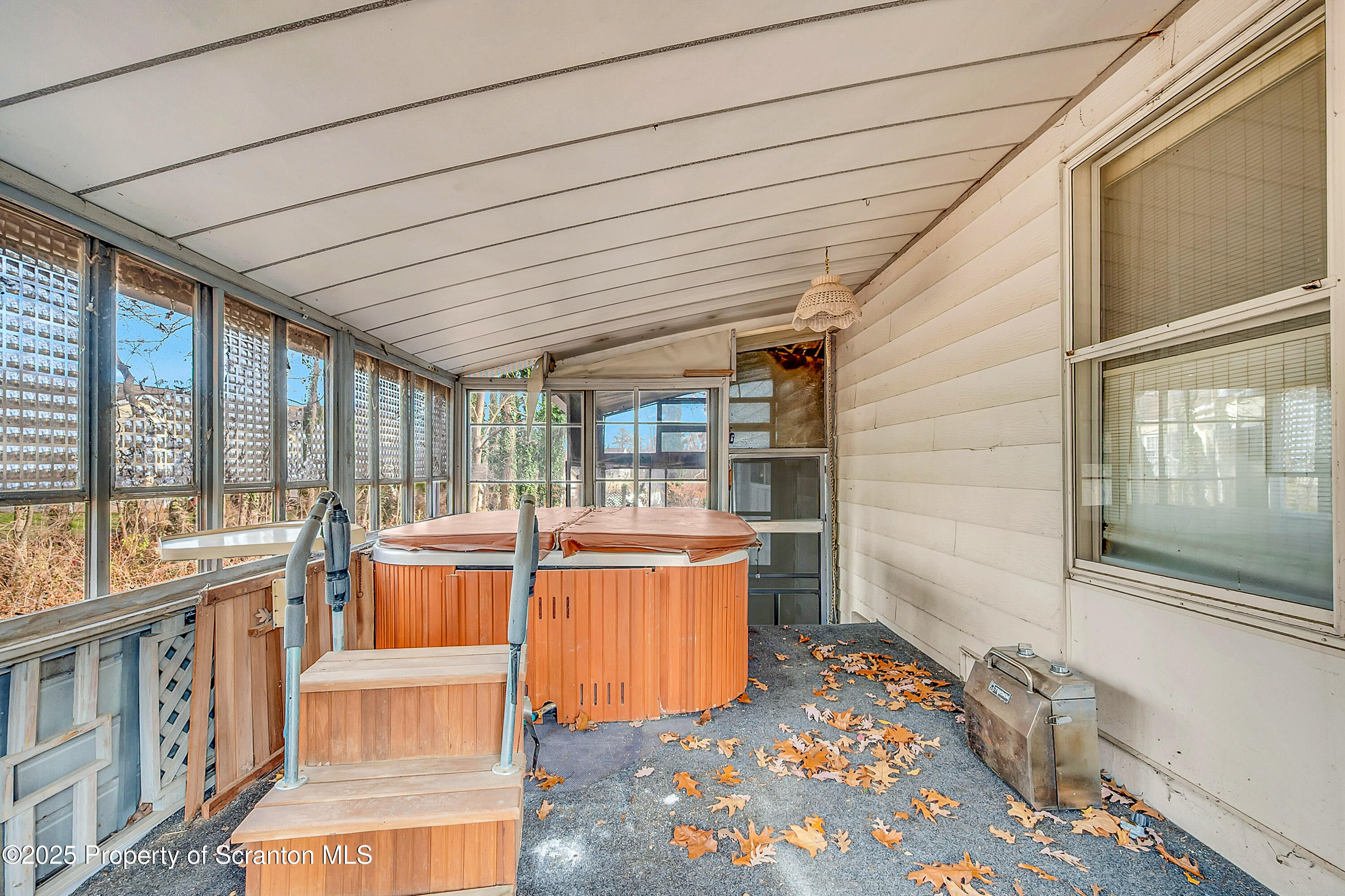 10 Bald Mt Road Clarks Summit, PA 18411 - Photo 42 of 42 a room with furniture and large windows