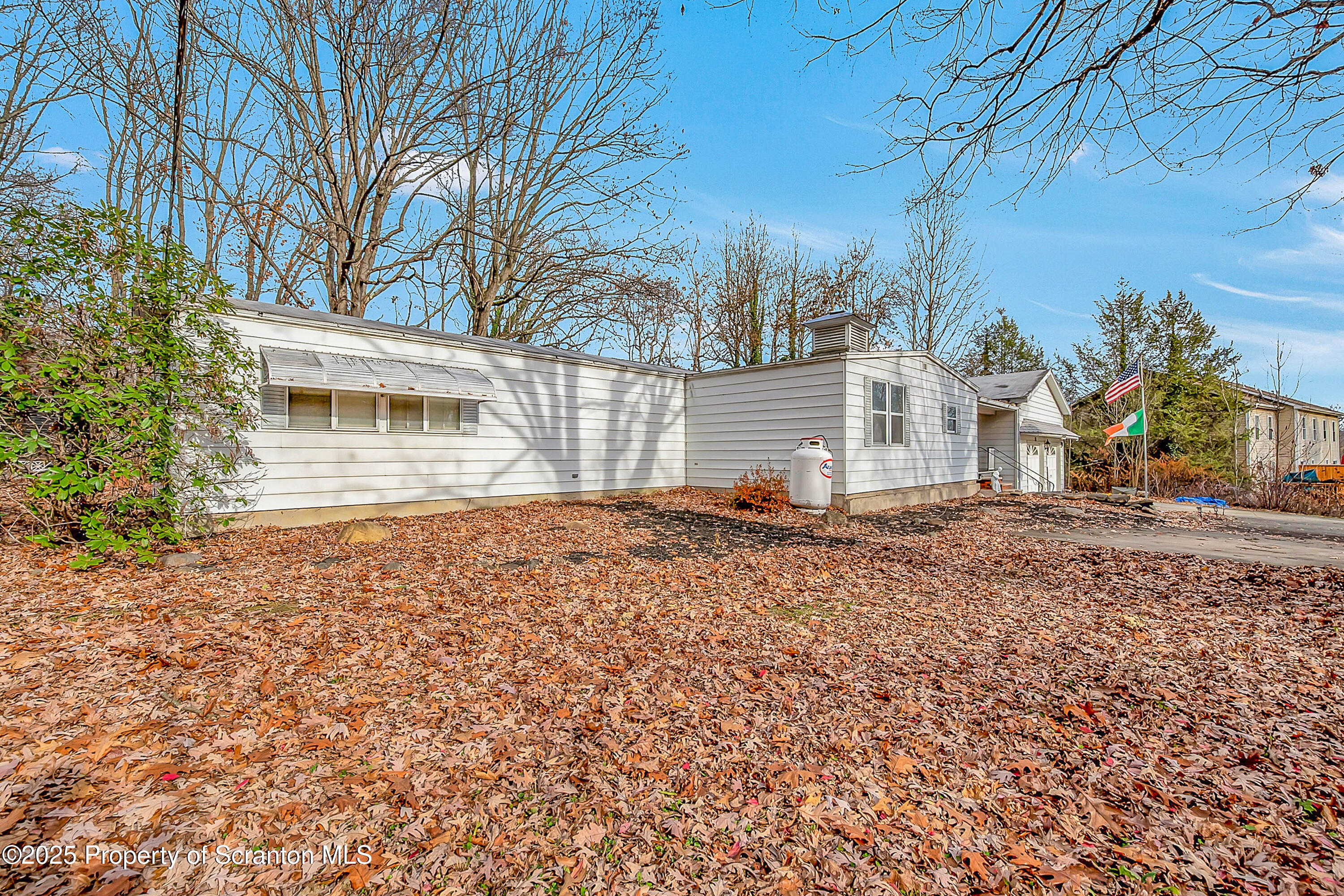 10 Bald Mt Road Clarks Summit, PA 18411 - Photo 7 of 42 a view of house with backyard and trees