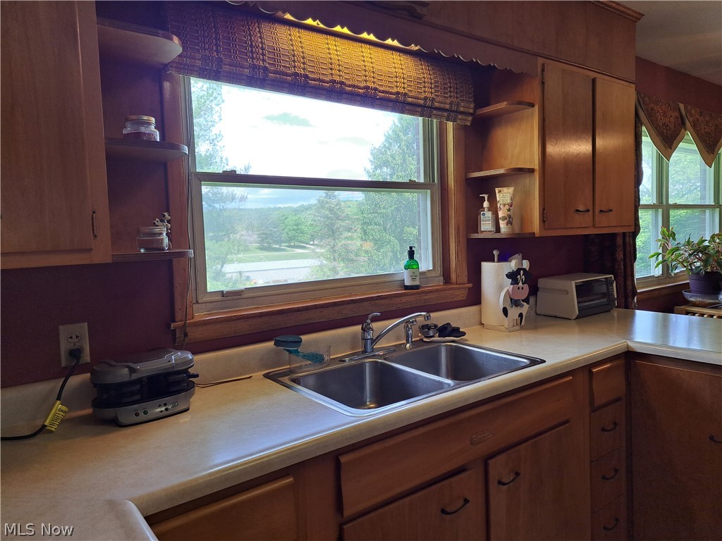3905 Mark Road Cambridge, OH 43725 - Photo 19 of 50 Kitchen featuring a wealth of natural light and sink
