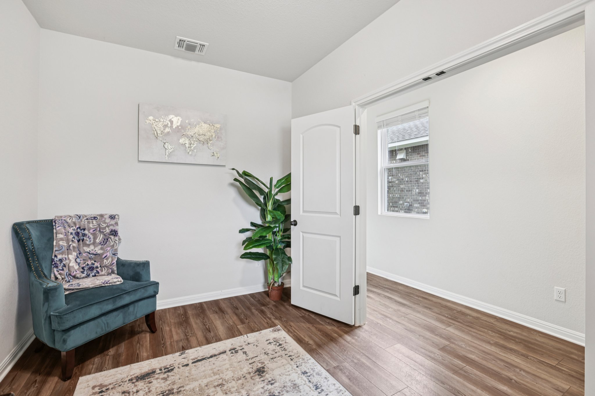 204 Swinging H Lane Georgetown, TX 78633 - Photo 11 of 39 a living room with furniture and a potted plant