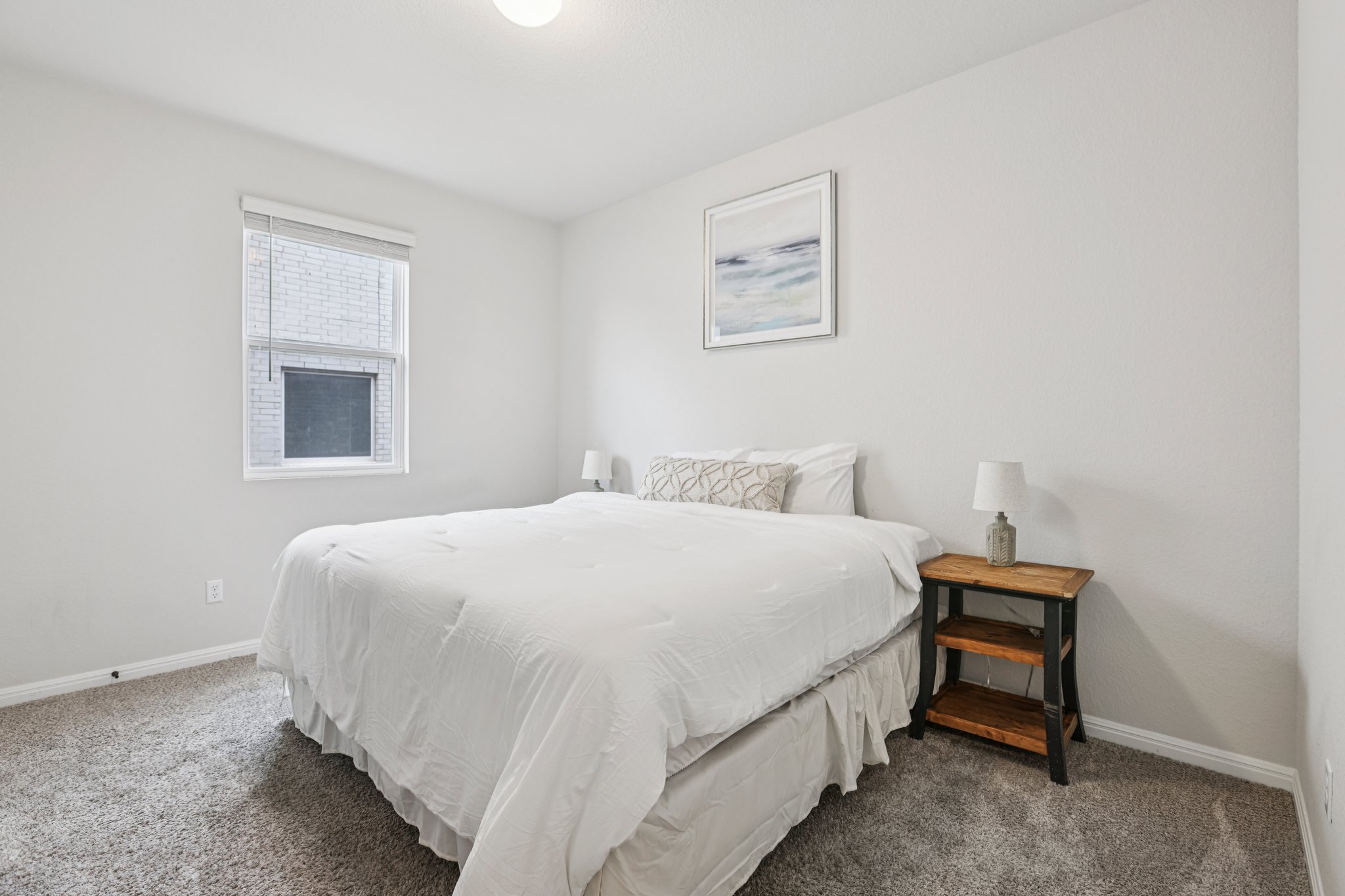 204 Swinging H Lane Georgetown, TX 78633 - Photo 18 of 39 a bedroom with a bed and a window
