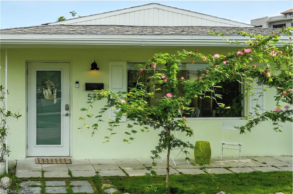 578 14th Street North Naples, FL 34102 - Photo 2 of 28 a view of a entryway door of the house