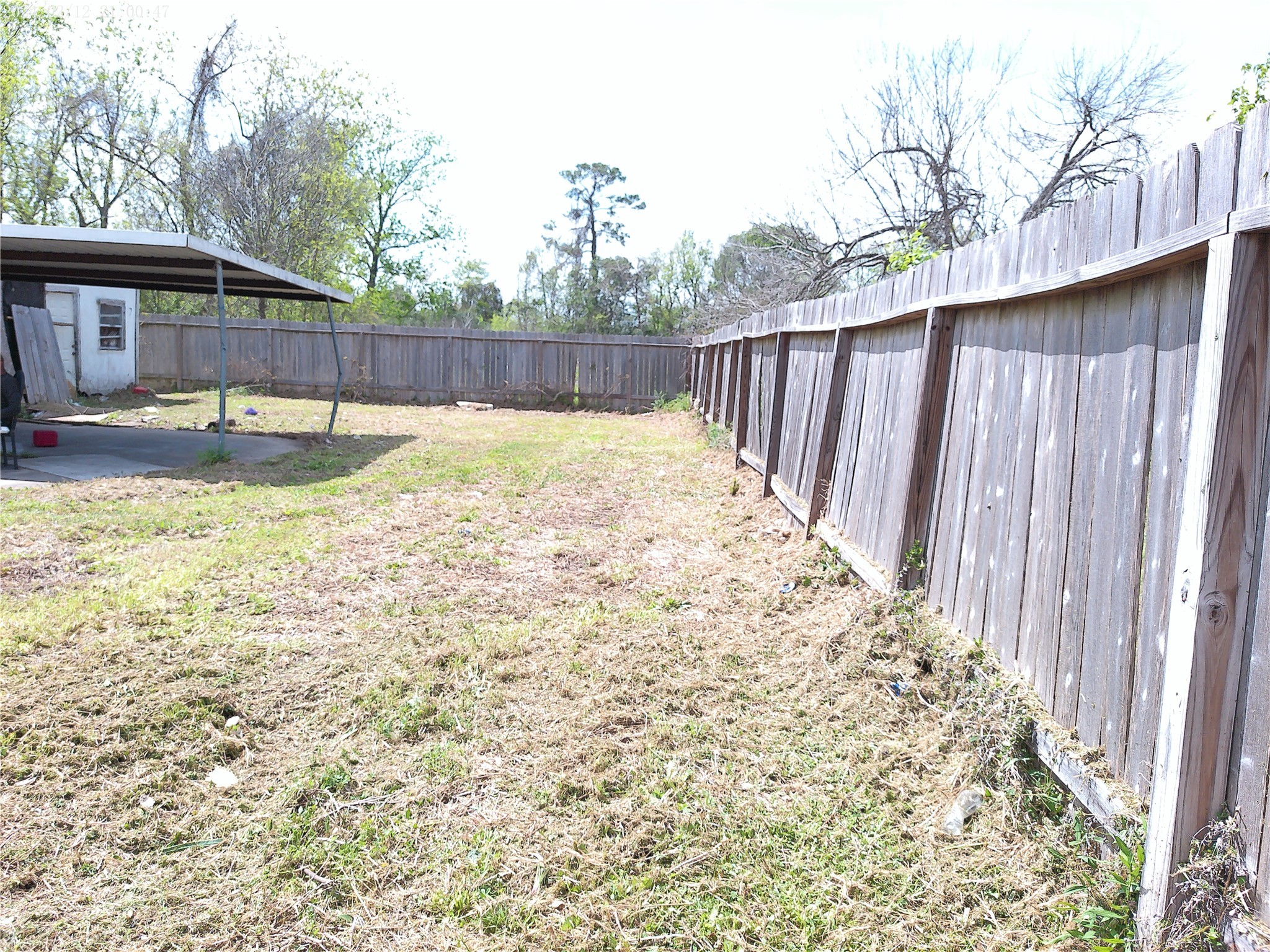 7949 Lockwood Drive Houston, TX 77016 - Photo 18 of 28 a swimming pool with wooden fence