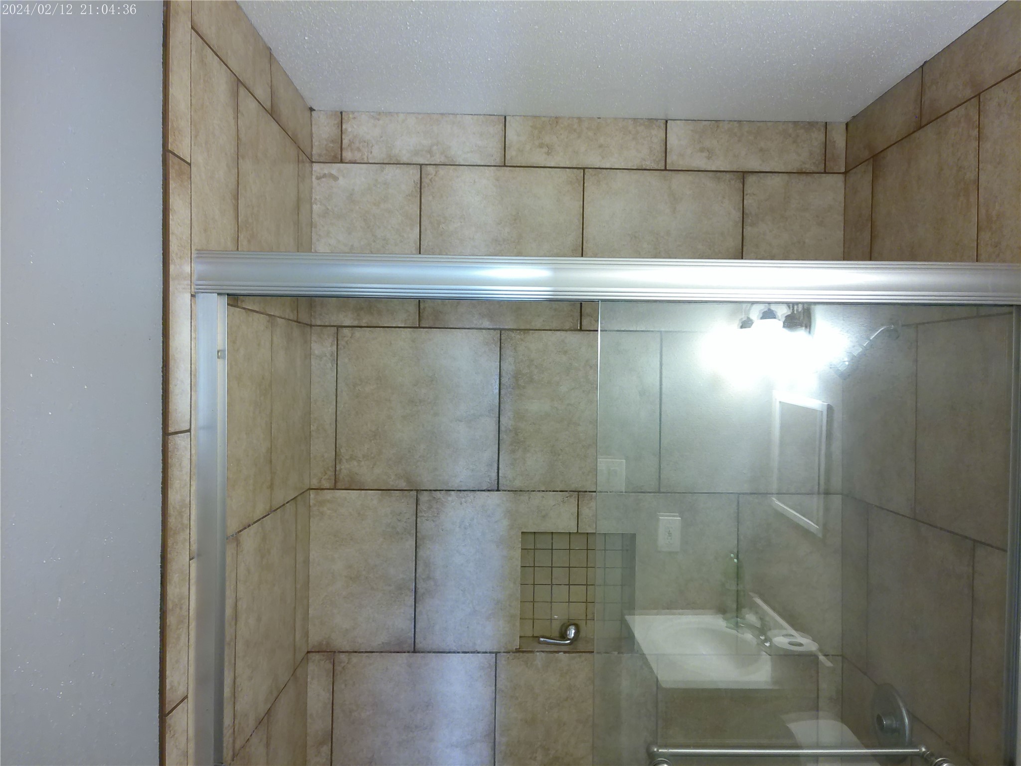 7949 Lockwood Drive Houston, TX 77016 - Photo 24 of 28 a bathroom with a shower