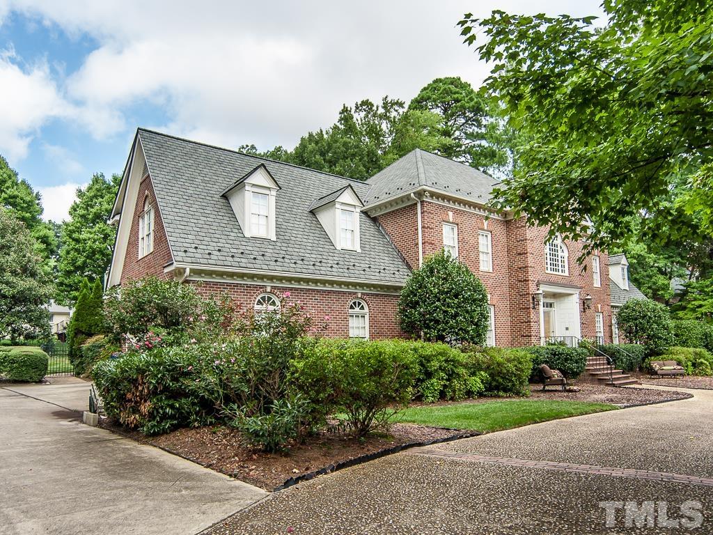 1905 Chase Court Raleigh, NC 27607 - Photo 2 of 61 front view of a house with a garden