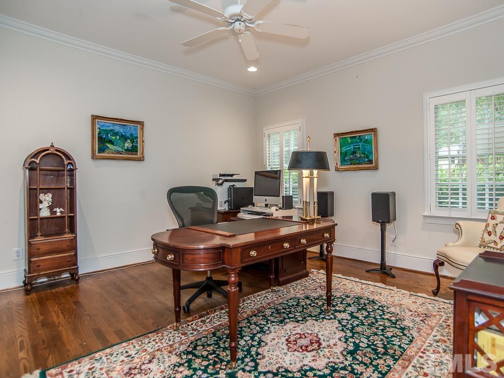 1905 Chase Court Raleigh, NC 27607 - Photo 53 of 61 a view of a workspace with furniture and wooden floor