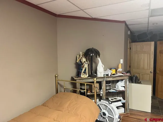 a bed room with a bed and a table