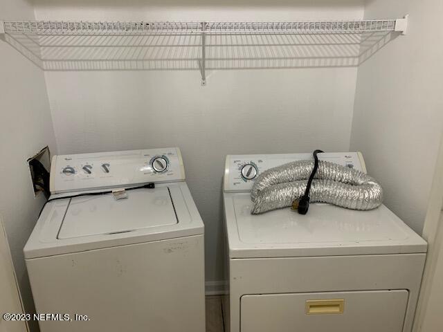 10550 Baymeadows Road, Unit 618 Jacksonville, FL 32256 - Photo 15 of 15 a utility room with dryer and washer