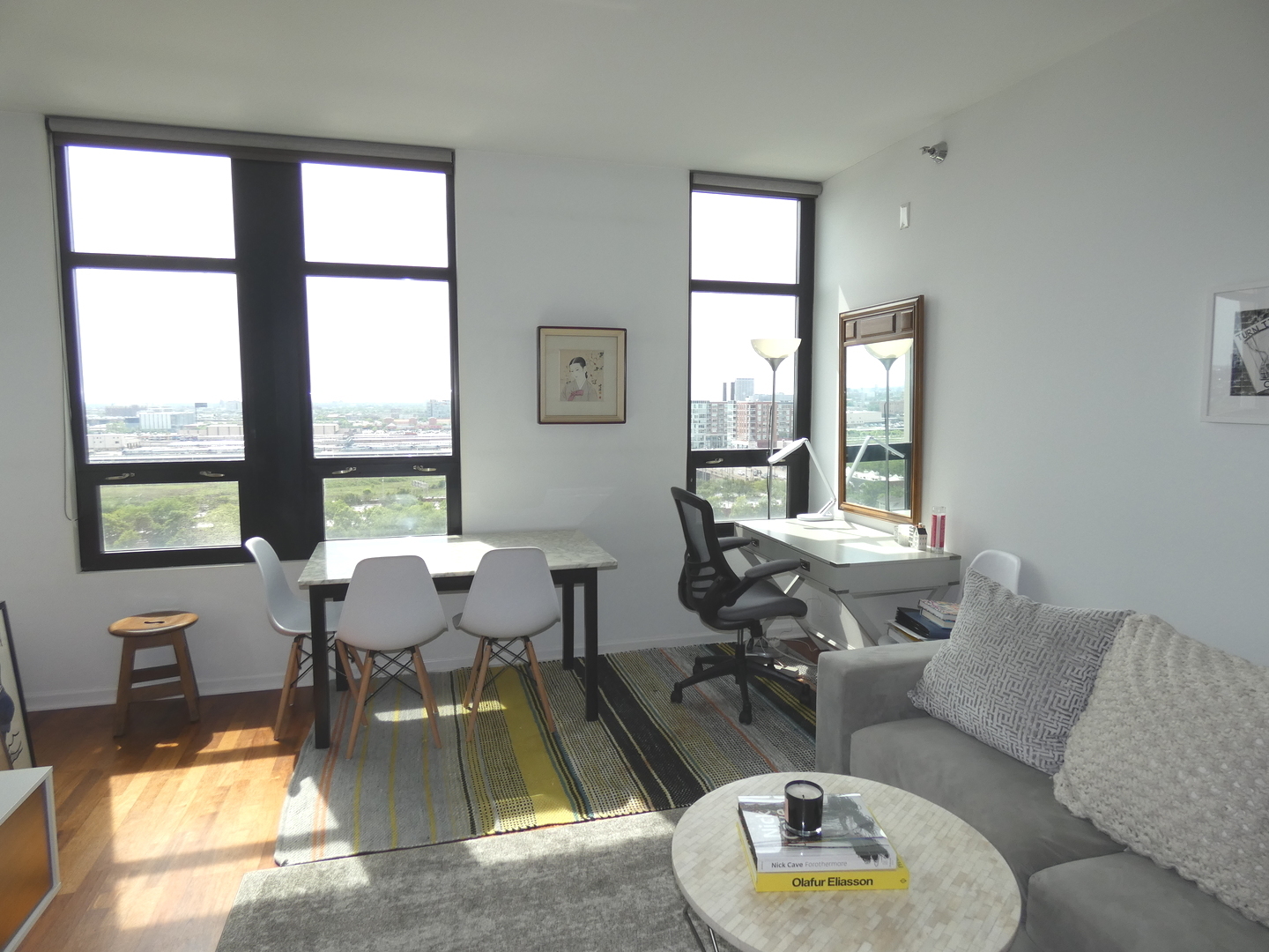 1255 South State Street, Unit 1414 Chicago, IL 60605 - Photo 5 of 24 a living room with furniture and a window