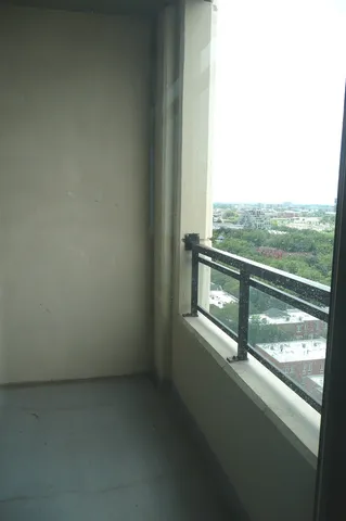 a view of a balcony with an outdoor space