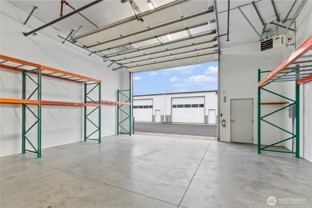 a view of storage and utility room with washer and dryer