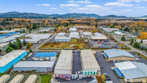 an aerial view of a houses with outdoor space