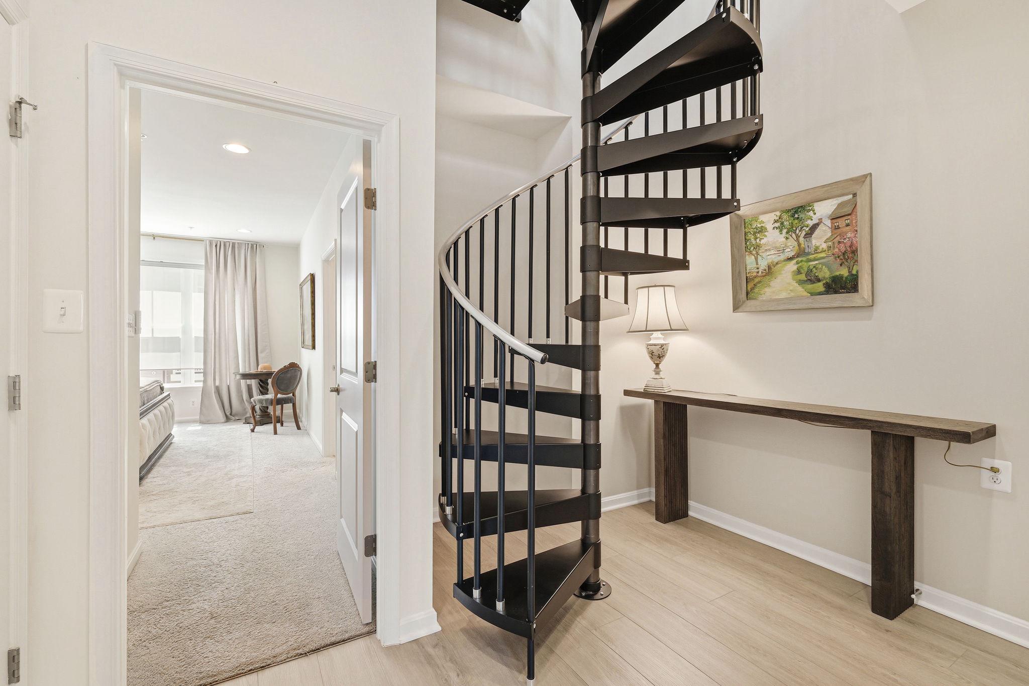 1110 Holden Road Frederick, MD 21701 - Photo 26 of 38 Spiral Staircase and nook to 4th Level