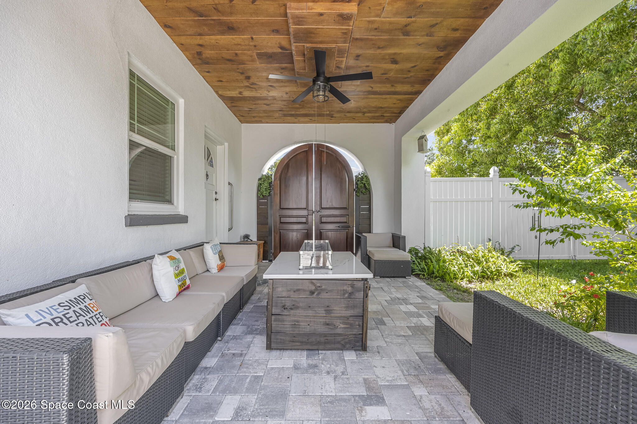 130 Valencia Road Rockledge, FL 32955 - Photo 47 of 66 Veranda with Fire Table