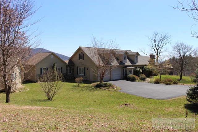 1824 Benge Ashe Road Purlear, NC 28665 - Photo 1 of 22 a view of a house with a yard