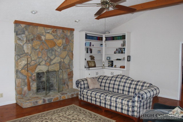 1824 Benge Ashe Road Purlear, NC 28665 - Photo 4 of 22 a bedroom with a bed and a window