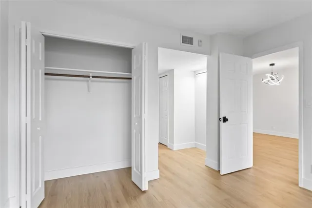 a view of a room with racks on the wall