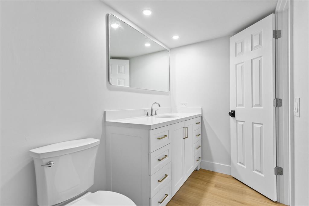 3000 South Course Drive, Unit 607 Pompano Beach, FL 33069 - Photo 26 of 33 a spacious bathroom with a double vanity sink and a mirror