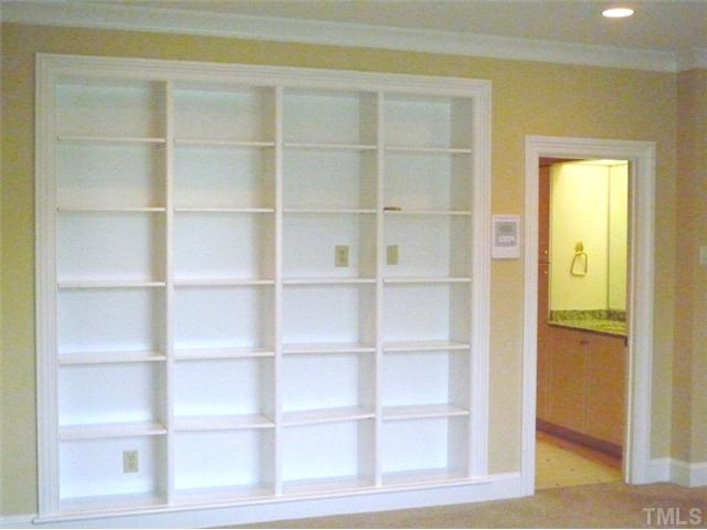 1817 Brassfield Road Raleigh, NC 27614 - Photo 15 of 25 a view of a room with shelves on the wall