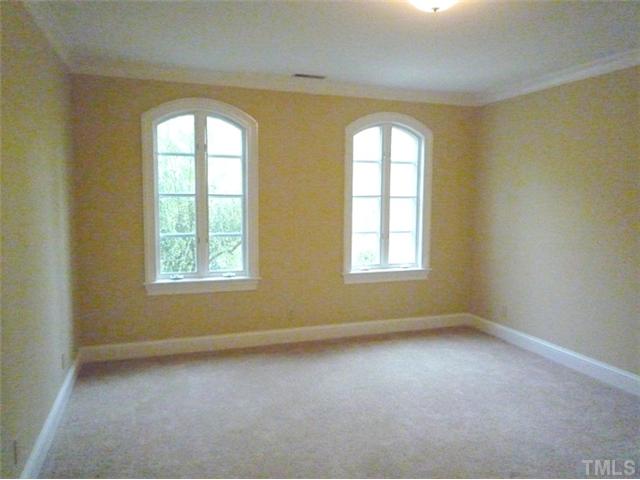 1817 Brassfield Road Raleigh, NC 27614 - Photo 18 of 25 an empty room with windows