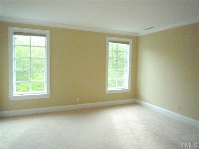 1817 Brassfield Road Raleigh, NC 27614 - Photo 19 of 25 an empty room with a window