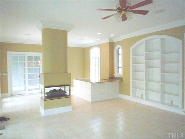 1817 Brassfield Road Raleigh, NC 27614 - Photo 20 of 25 a view of an empty room with a window