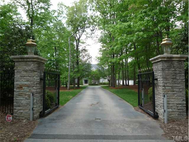 1817 Brassfield Road Raleigh, NC 27614 - Photo 2 of 25 a view of a street with a building in the background
