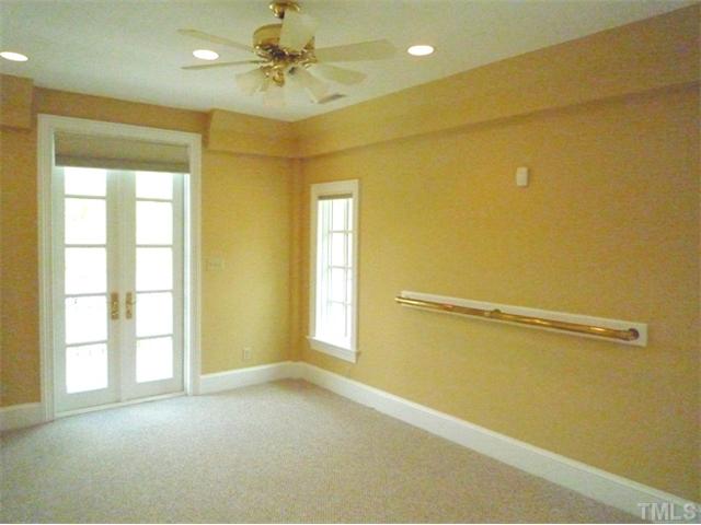 1817 Brassfield Road Raleigh, NC 27614 - Photo 21 of 25 a view of an empty room with a window