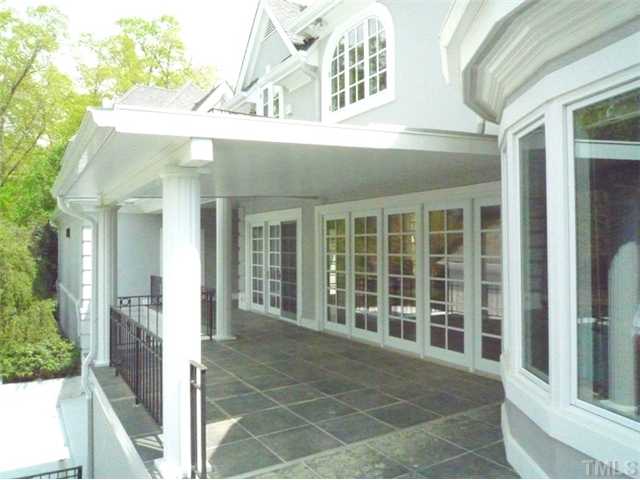 1817 Brassfield Road Raleigh, NC 27614 - Photo 22 of 25 a view of a building with a glass door