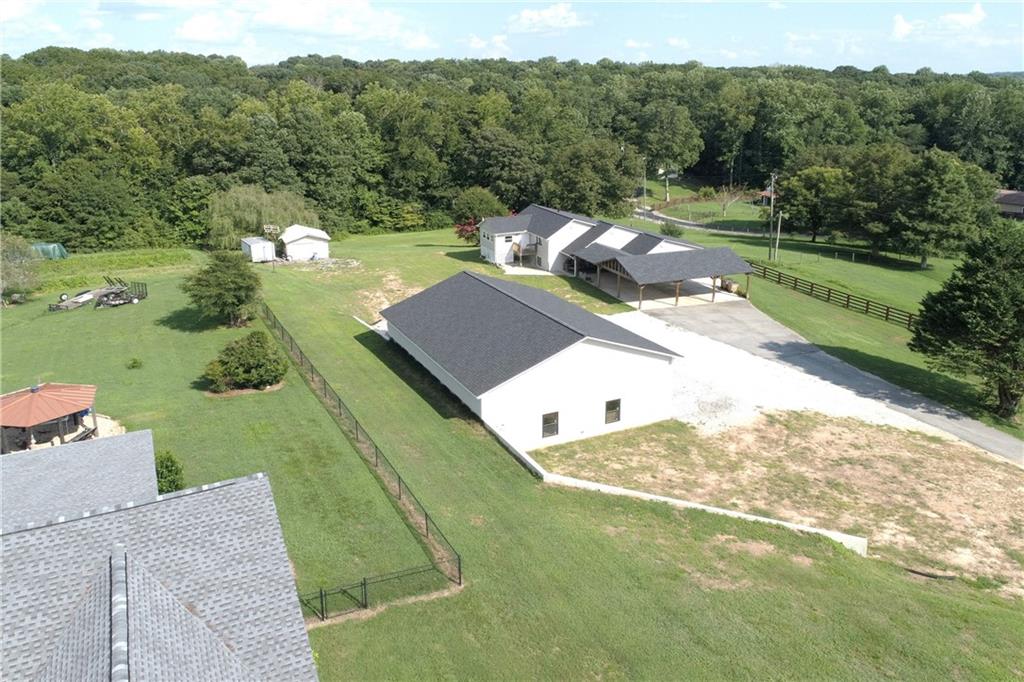 3959 Sloan Mill Road Gainesville, GA 30507 - Photo 1 of 1 a view of a street with a yard