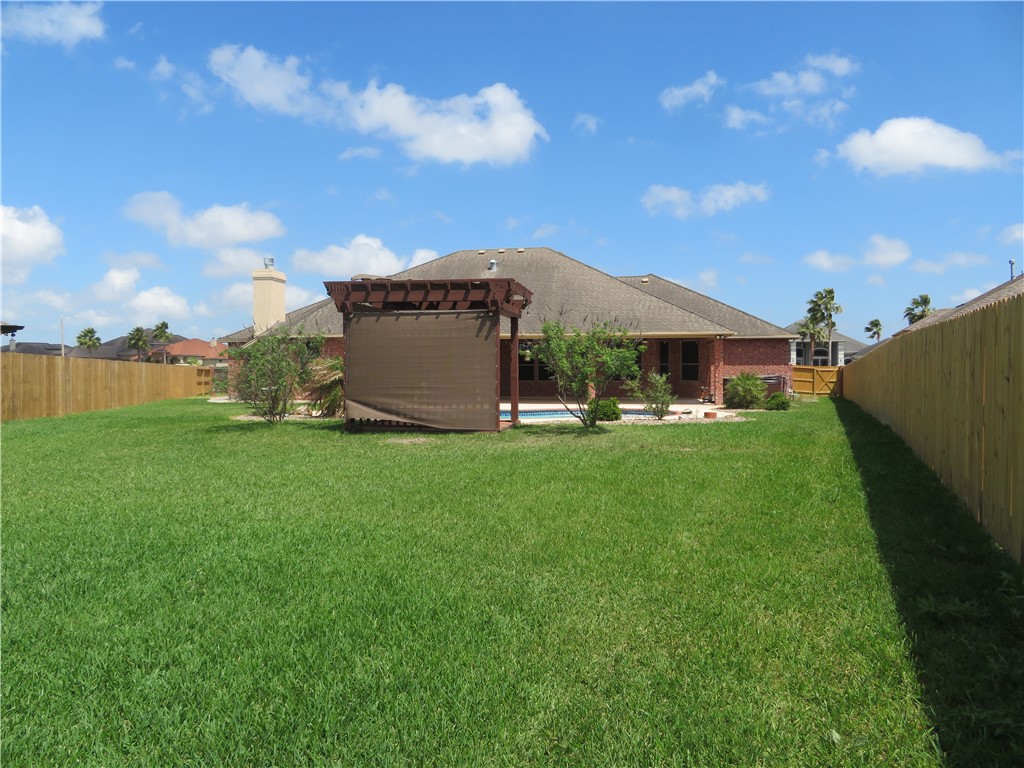 5803 South Oso Parkway Corpus Christi, TX 78414 - Photo 39 of 39 a view of a house with a big yard and large trees