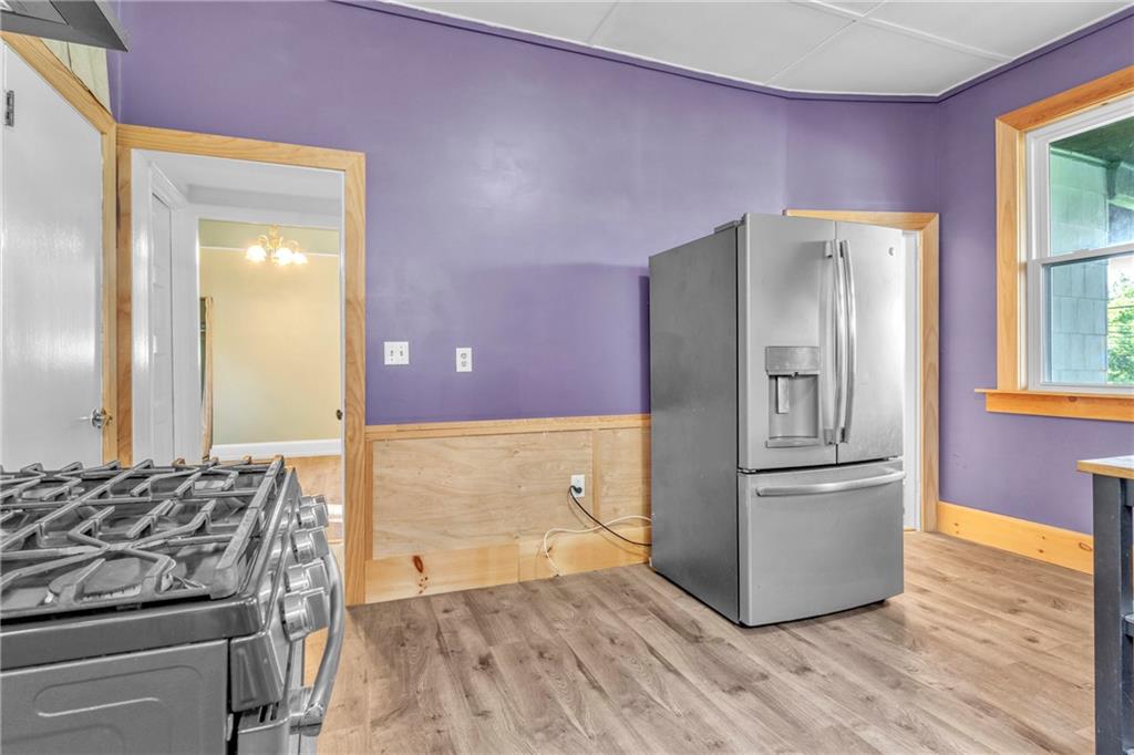 69 Transvaal Avenue Pittsburgh, PA 15212 - Photo 14 of 37 a kitchen with stainless steel appliances granite countertop a refrigerator and a stove