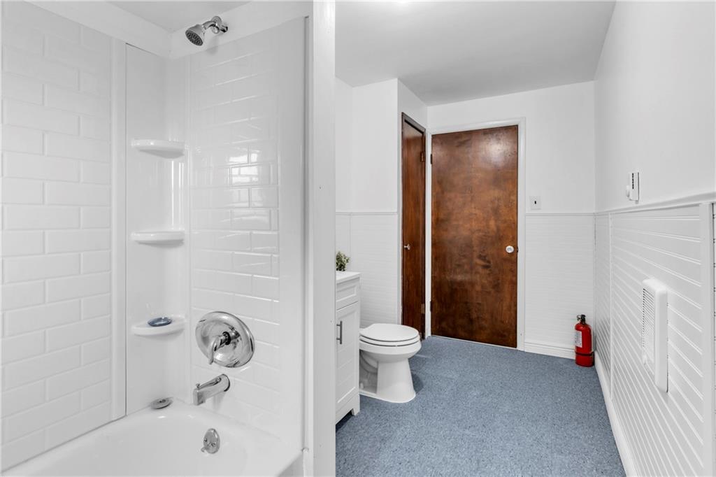 69 Transvaal Avenue Pittsburgh, PA 15212 - Photo 24 of 37 a bathroom with a bathtub and a shower