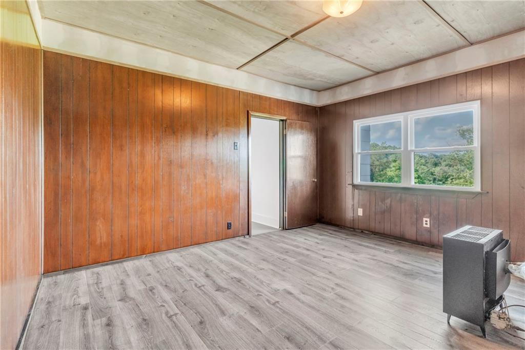 69 Transvaal Avenue Pittsburgh, PA 15212 - Photo 27 of 37 a view of an empty room with wooden floor and a window