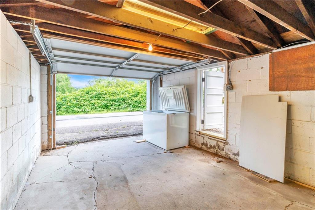 69 Transvaal Avenue Pittsburgh, PA 15212 - Photo 33 of 37 a view of a room with a refrigerator and a window
