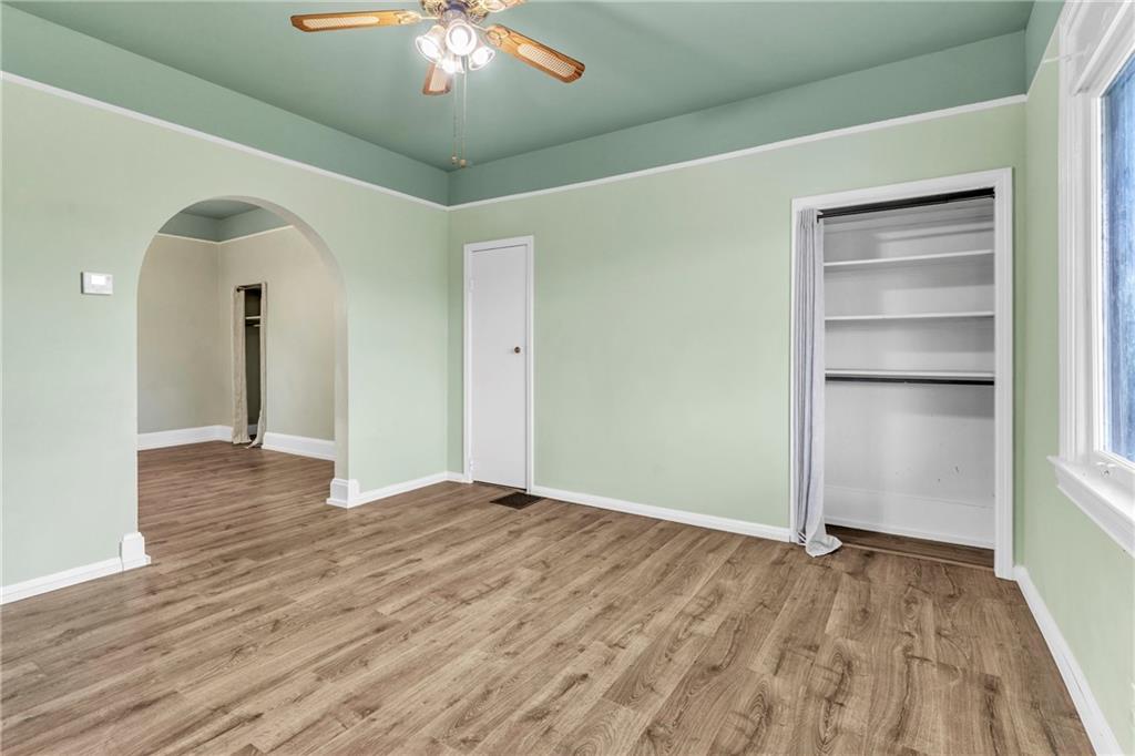 69 Transvaal Avenue Pittsburgh, PA 15212 - Photo 6 of 37 a view of an empty room and wooden floor