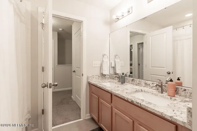 a view of a hallway with a bedroom