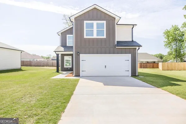 a front view of house with yard