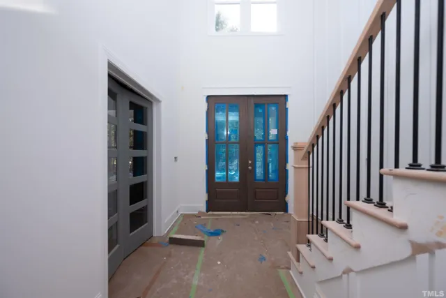 a kitchen with a sink a stove and cabinets