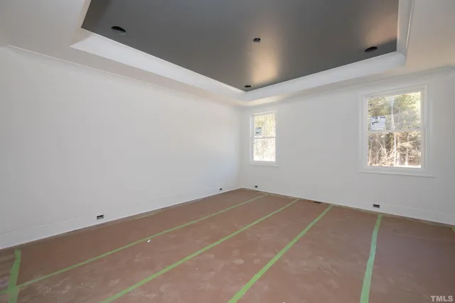 a bathroom with a bathtub sink and mirror