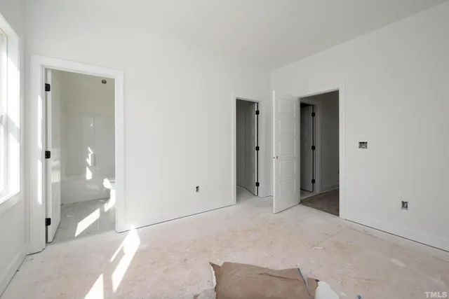 an empty room with windows