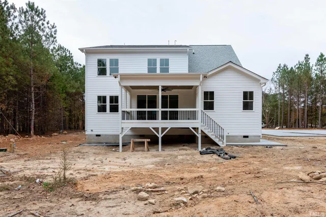a view of a porch with wooden floor and outdoor space