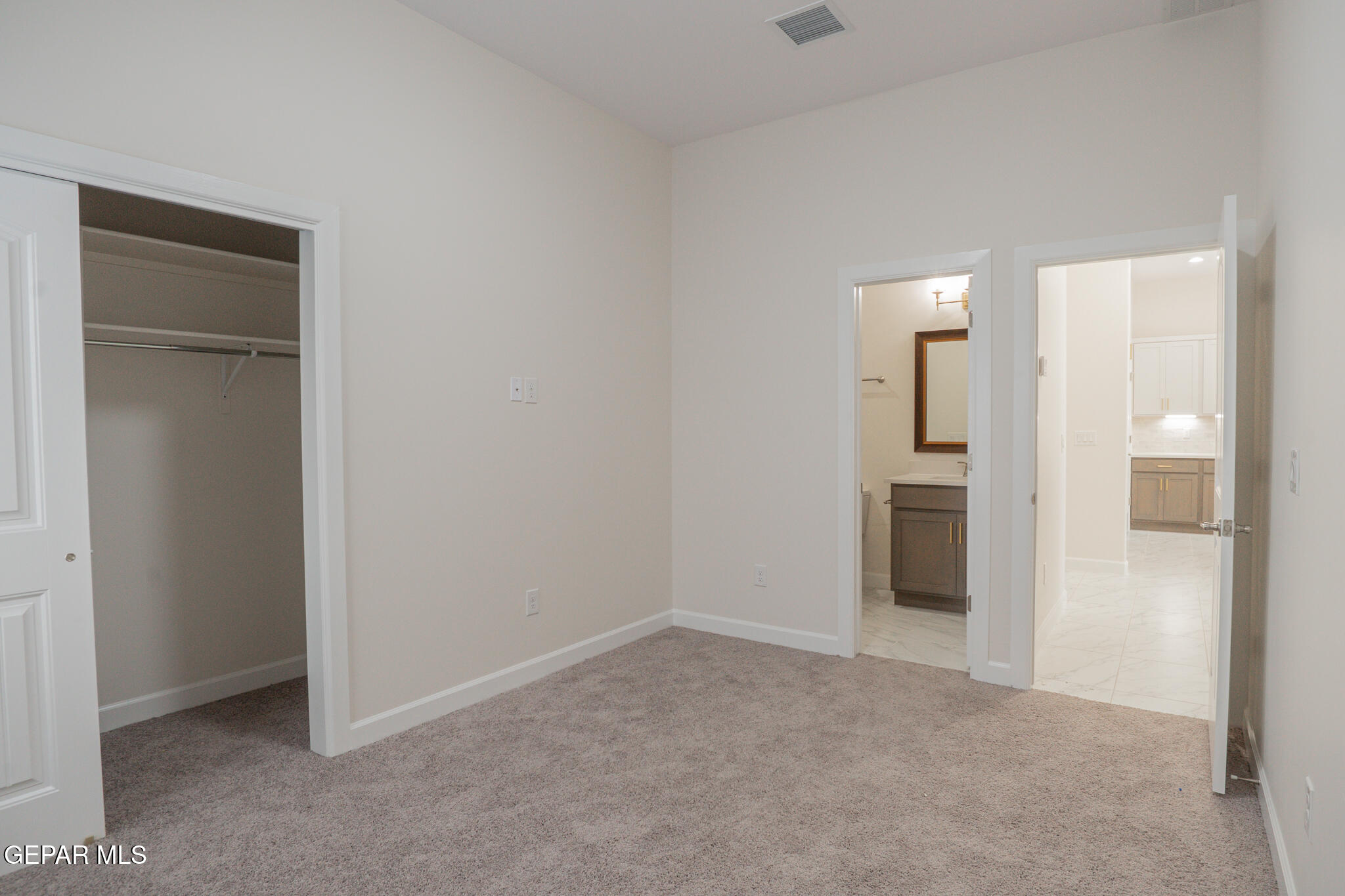 3769 Course Street El Paso, TX 79938 - Photo 16 of 34 an empty room with closet and a bathroom