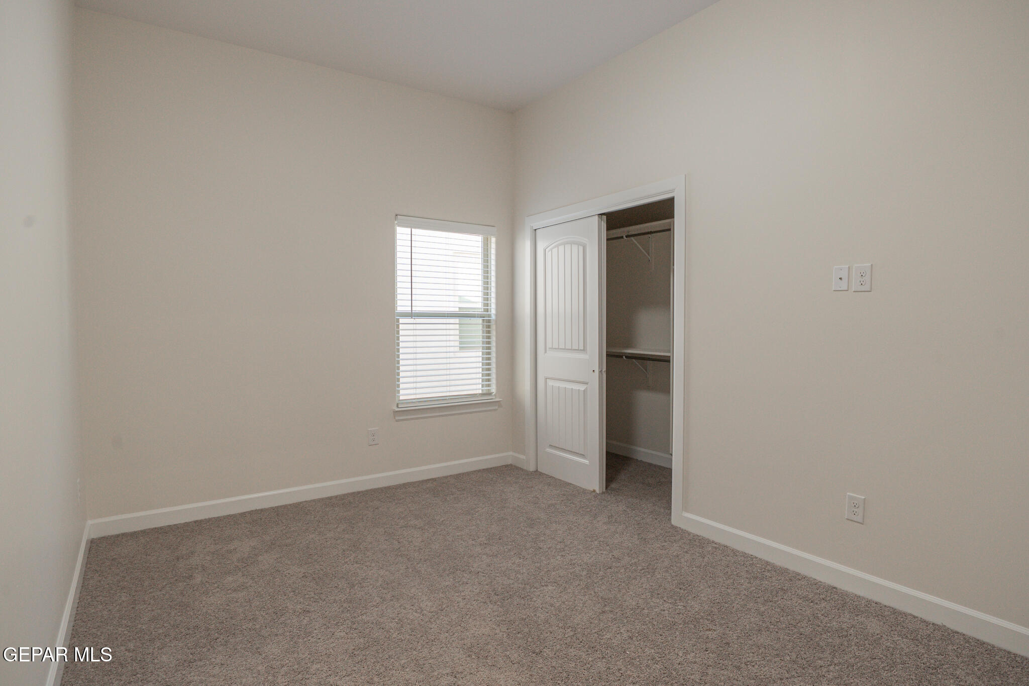 3769 Course Street El Paso, TX 79938 - Photo 22 of 34 an empty room with windows and closet