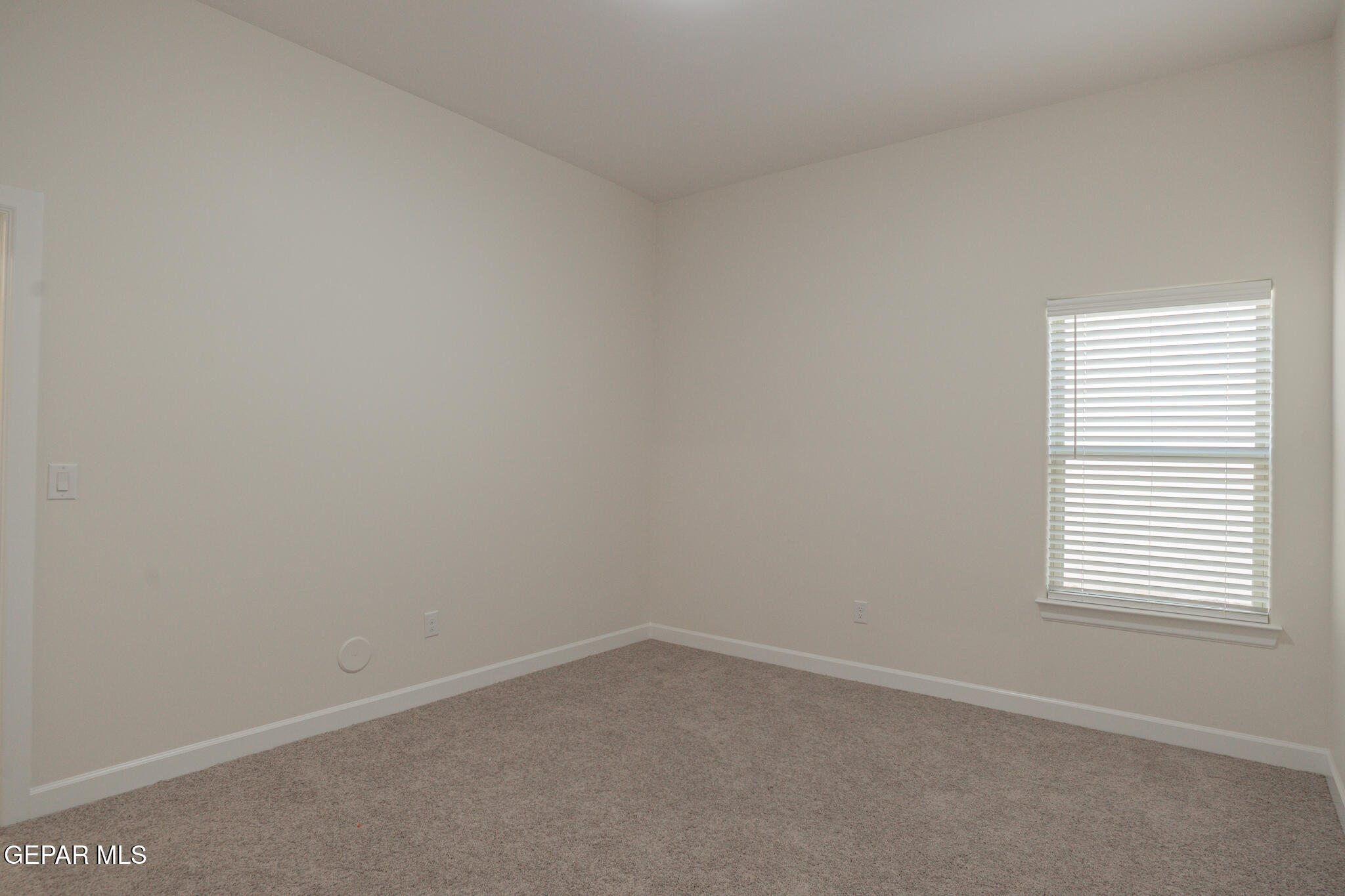 3769 Course Street El Paso, TX 79938 - Photo 24 of 34 an empty room with a window