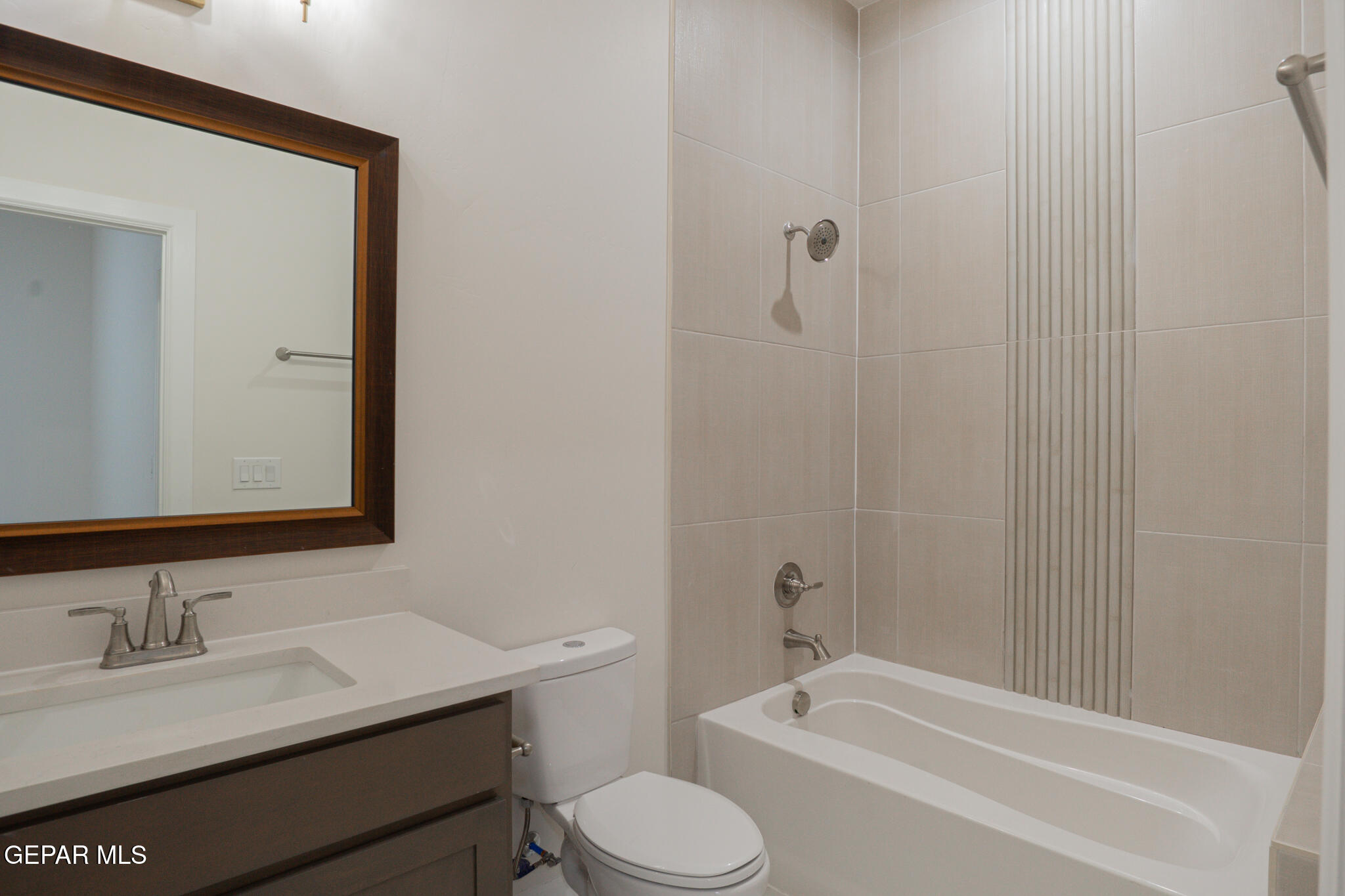 3769 Course Street El Paso, TX 79938 - Photo 27 of 34 a bathroom with a sink toilet and shower