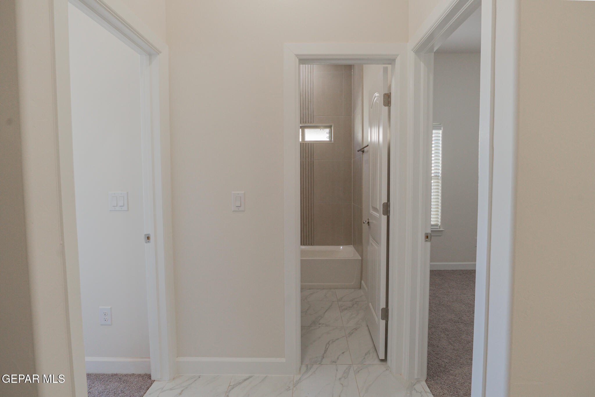 3769 Course Street El Paso, TX 79938 - Photo 29 of 34 a bathroom with a shower and a glass door