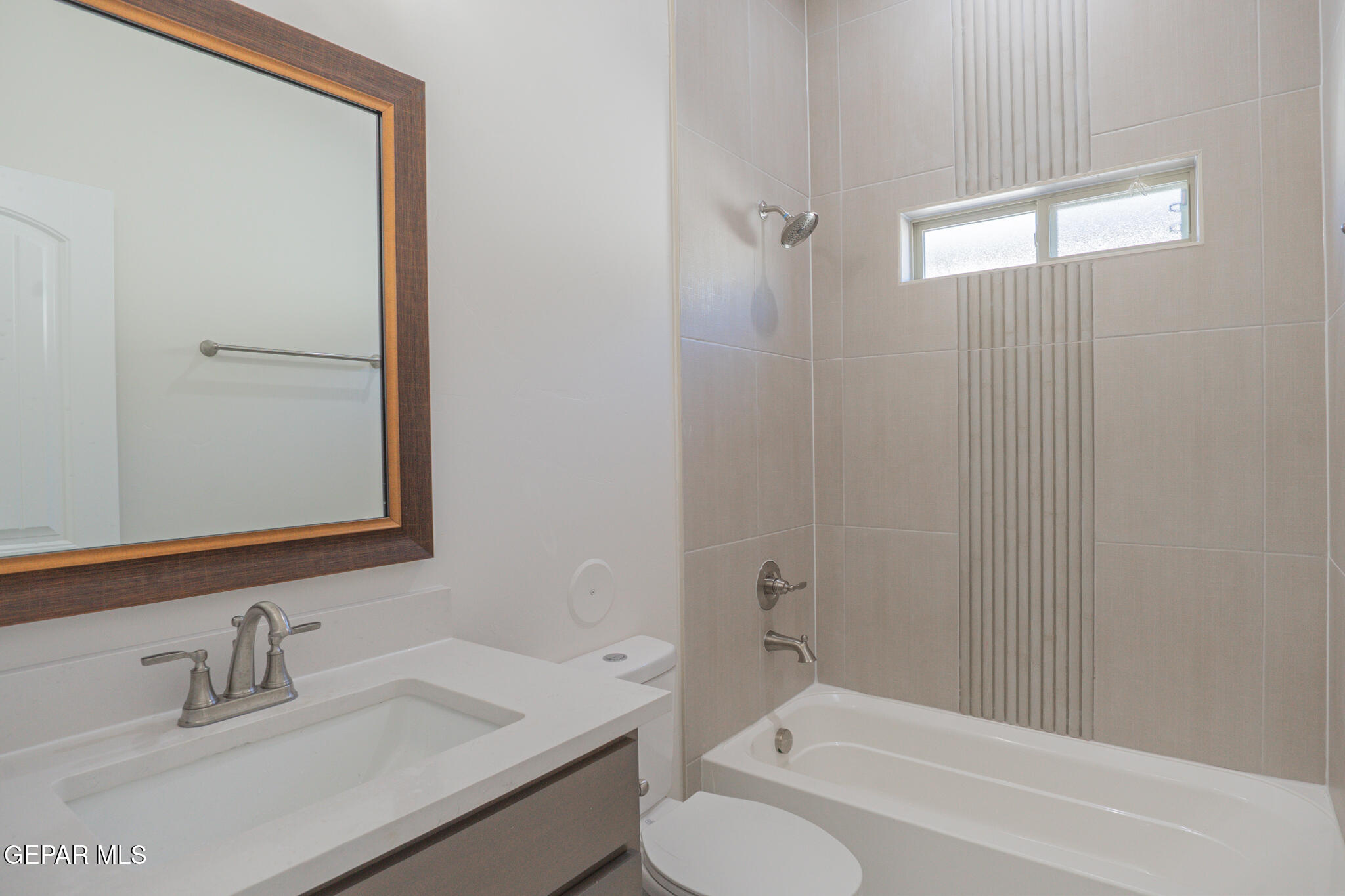 3769 Course Street El Paso, TX 79938 - Photo 32 of 34 a bathroom with a sink and a mirror