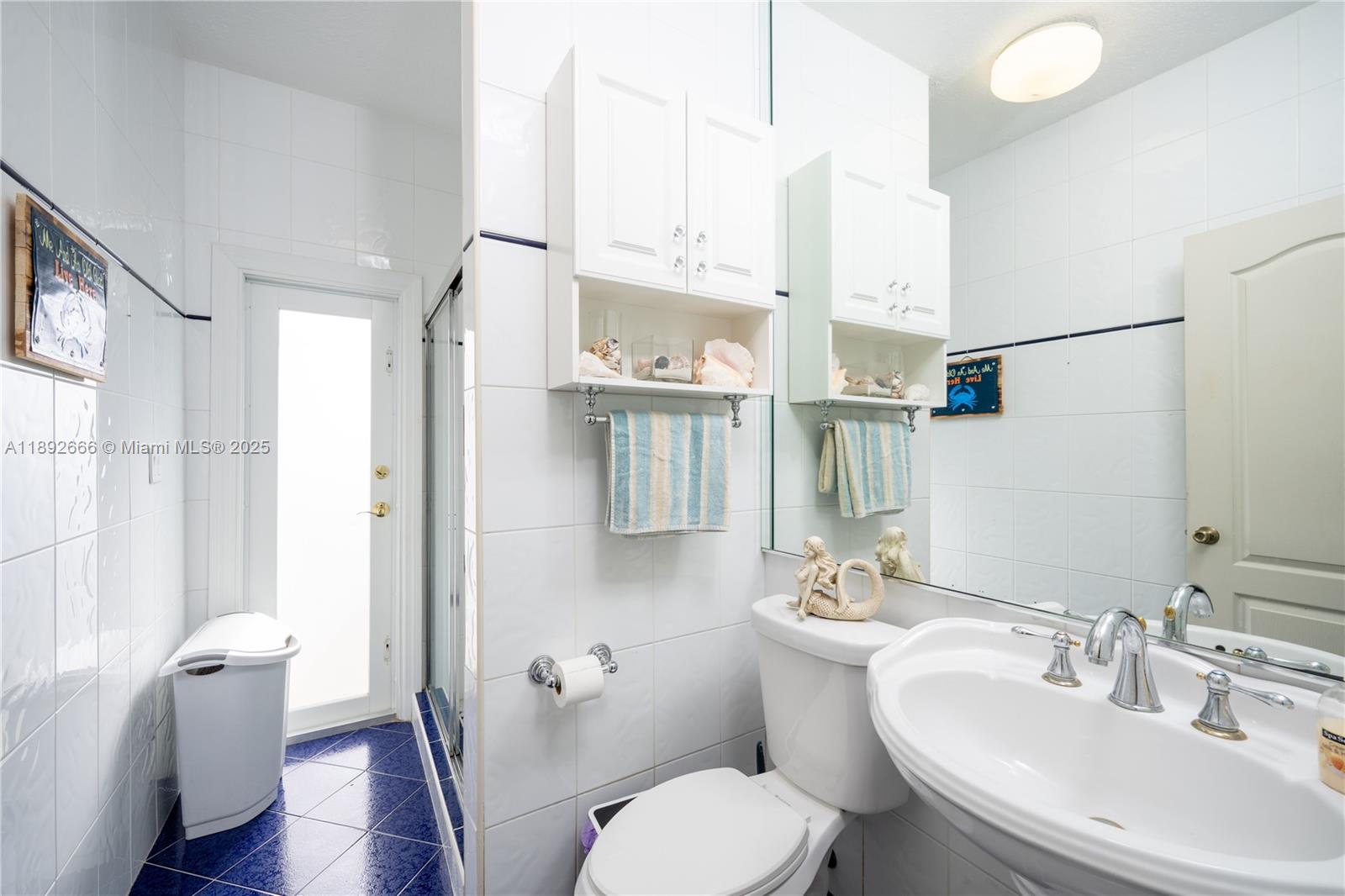 2275 Southwest 143rd Court Miami, FL 33175 - Photo 11 of 64 a bathroom with a sink toilet and shower