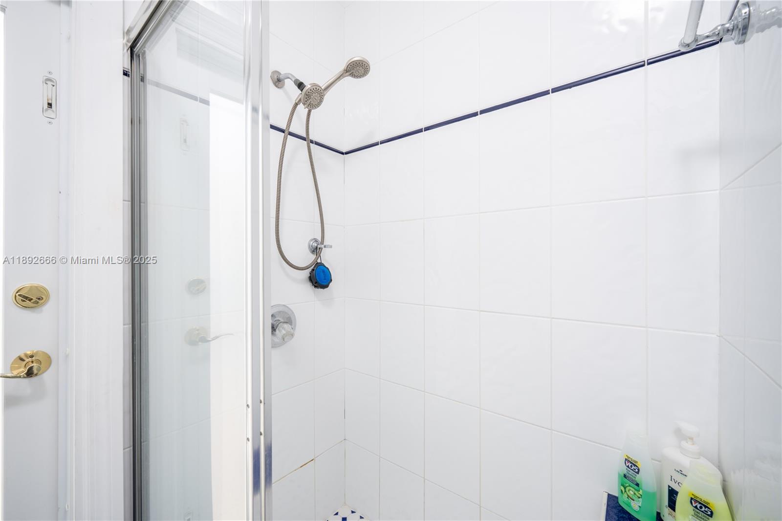 2275 Southwest 143rd Court Miami, FL 33175 - Photo 12 of 64 a bathroom with a shower